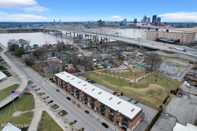 birds eye view of property featuring a view of city and a water view