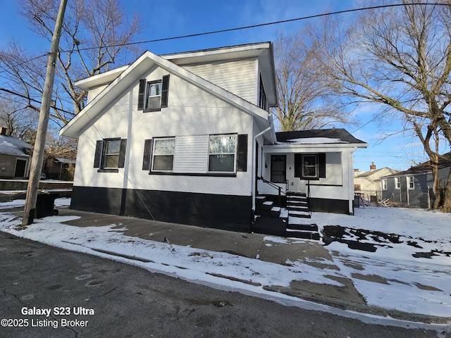 view of front of home featuring brick siding