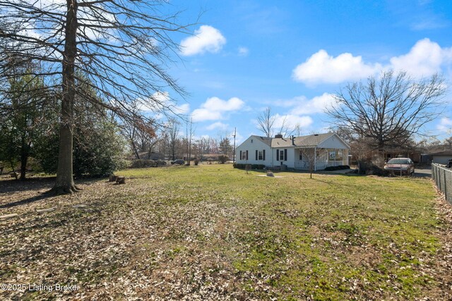 view of yard with fence