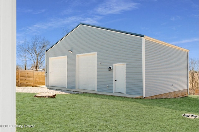 garage with fence