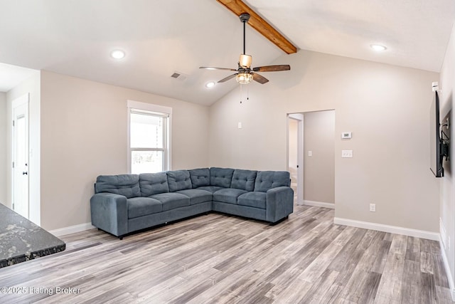 living area featuring lofted ceiling with beams, light wood-type flooring, visible vents, and baseboards