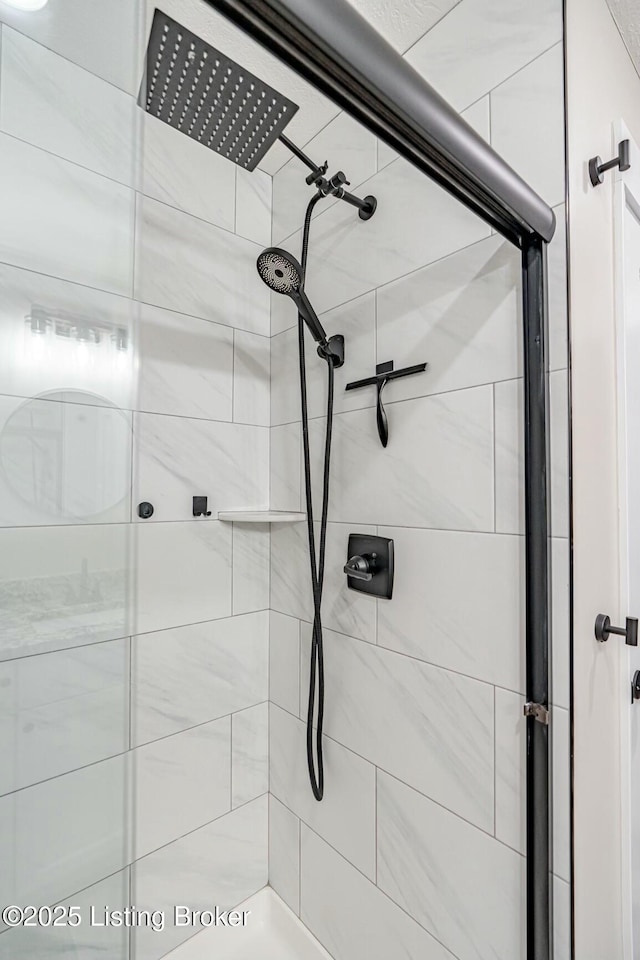 full bathroom featuring a shower stall