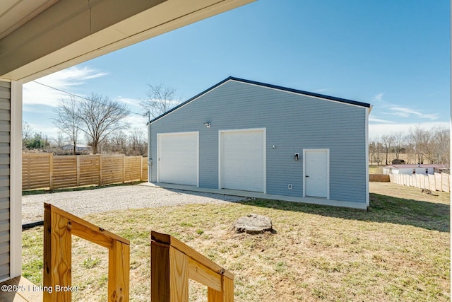 detached garage with fence