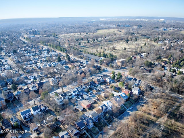 birds eye view of property with a residential view