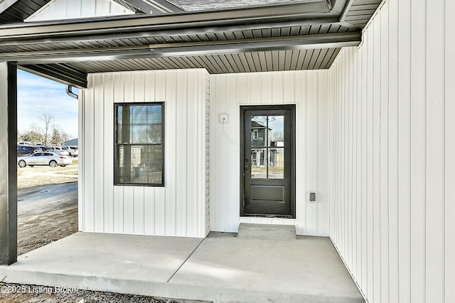 property entrance with board and batten siding