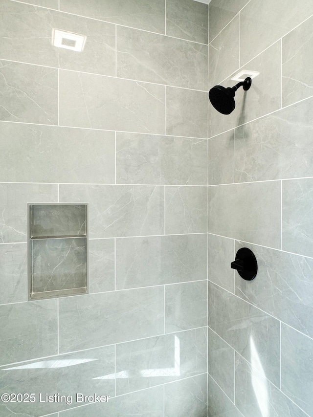 interior space with a tile shower