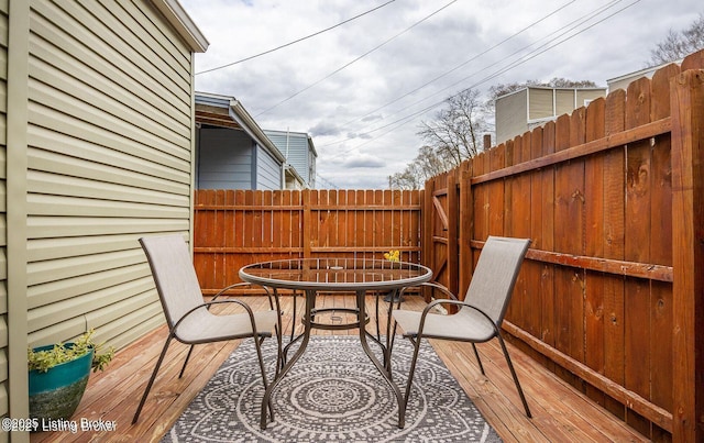 view of patio / terrace featuring outdoor dining space and fence