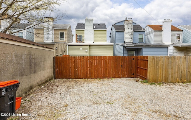 view of yard with fence and a residential view