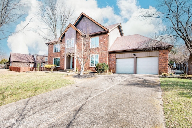 view of front of home featuring driveway, brick siding, a front lawn, and an attached garage