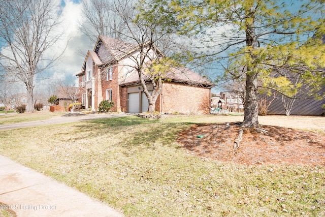 view of front of home featuring a garage, a front lawn, and brick siding