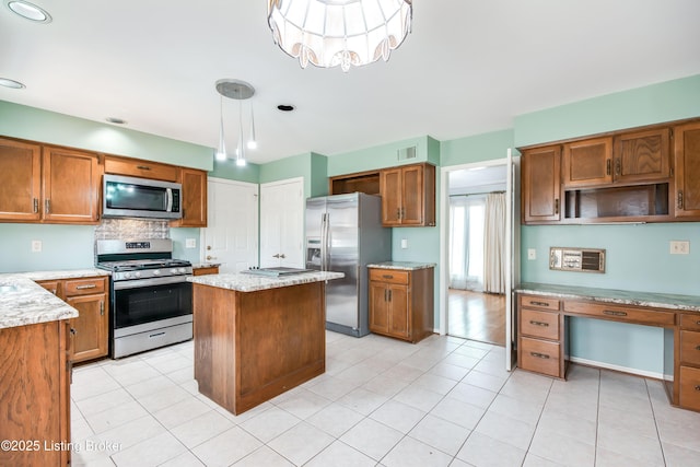 kitchen with open shelves, a kitchen island, appliances with stainless steel finishes, and brown cabinets