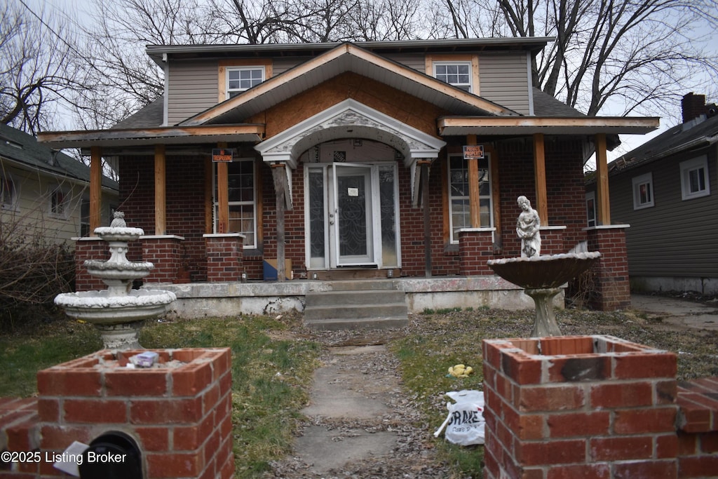 bungalow with brick siding