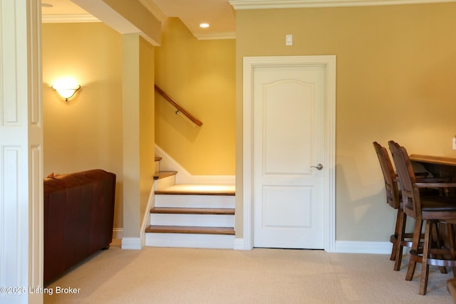 interior space featuring baseboards, recessed lighting, carpet flooring, and crown molding