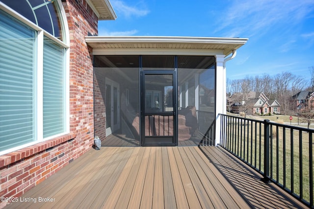 deck with a sunroom