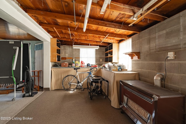 below grade area featuring wood ceiling