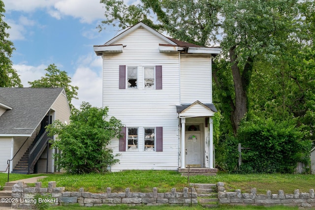 2523 Saint Xavier St, Louisville, KY 40212 - traditional-style house with a front yard