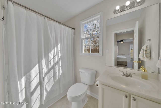 full bath with ensuite bathroom, toilet, a shower with shower curtain, vanity, and tile patterned floors