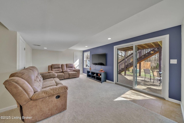 carpeted living area with recessed lighting, tile patterned flooring, visible vents, and baseboards