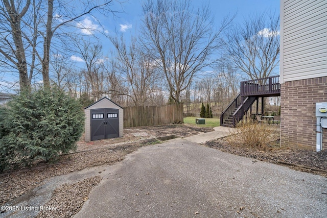 exterior space featuring stairs and driveway