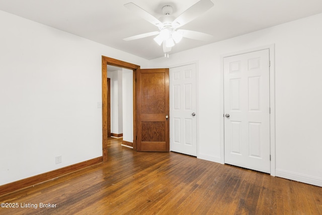 unfurnished bedroom featuring a ceiling fan, baseboards, and hardwood / wood-style floors