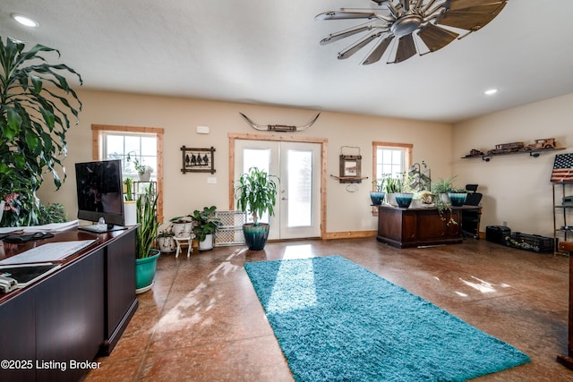 foyer with recessed lighting, plenty of natural light, baseboards, and french doors