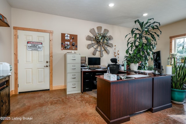 office area featuring recessed lighting and baseboards