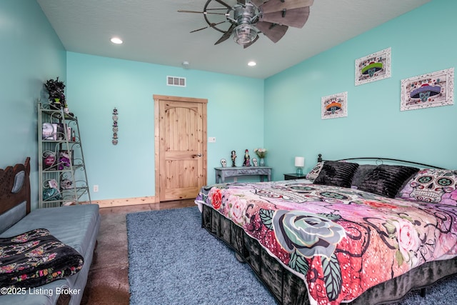 bedroom featuring carpet, visible vents, a textured ceiling, and recessed lighting