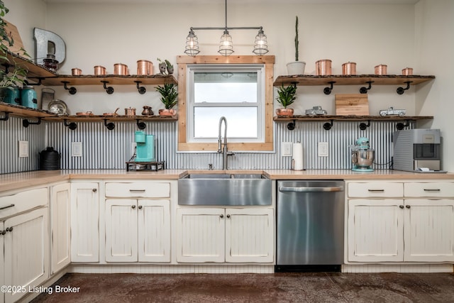 kitchen with light countertops, a sink, stainless steel dishwasher, and open shelves