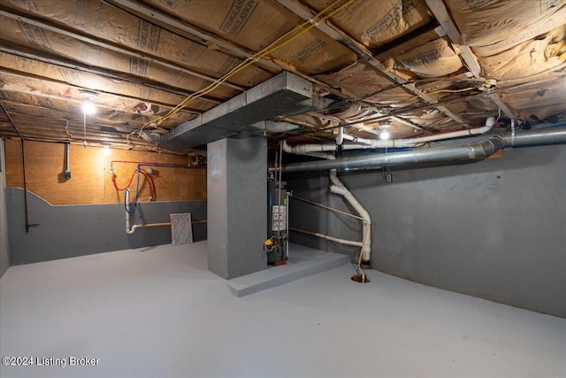 unfinished below grade area featuring gas water heater