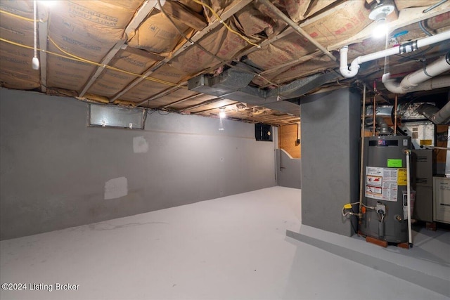 unfinished basement featuring gas water heater