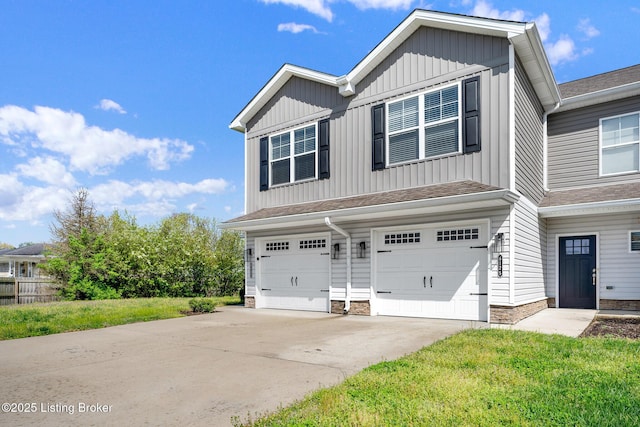 view of front of home featuring a garage, roof with shingles, board and batten siding, and concrete driveway