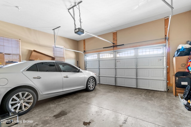 garage featuring a garage door opener