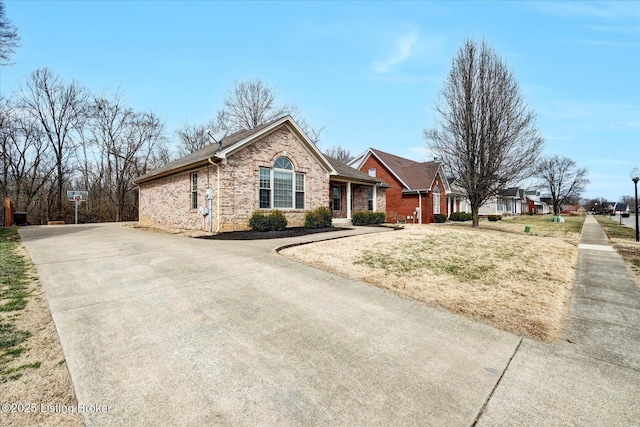 single story home with brick siding