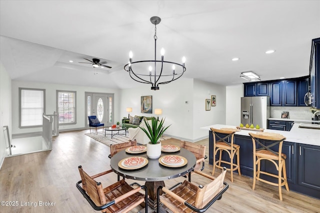 dining area featuring a ceiling fan, recessed lighting, baseboards, and light wood finished floors