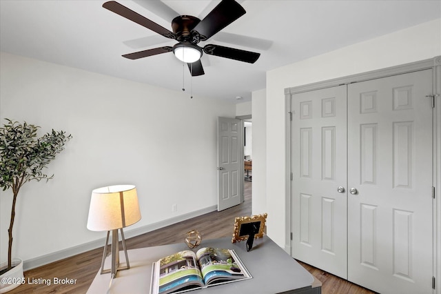 office space featuring wood finished floors and baseboards