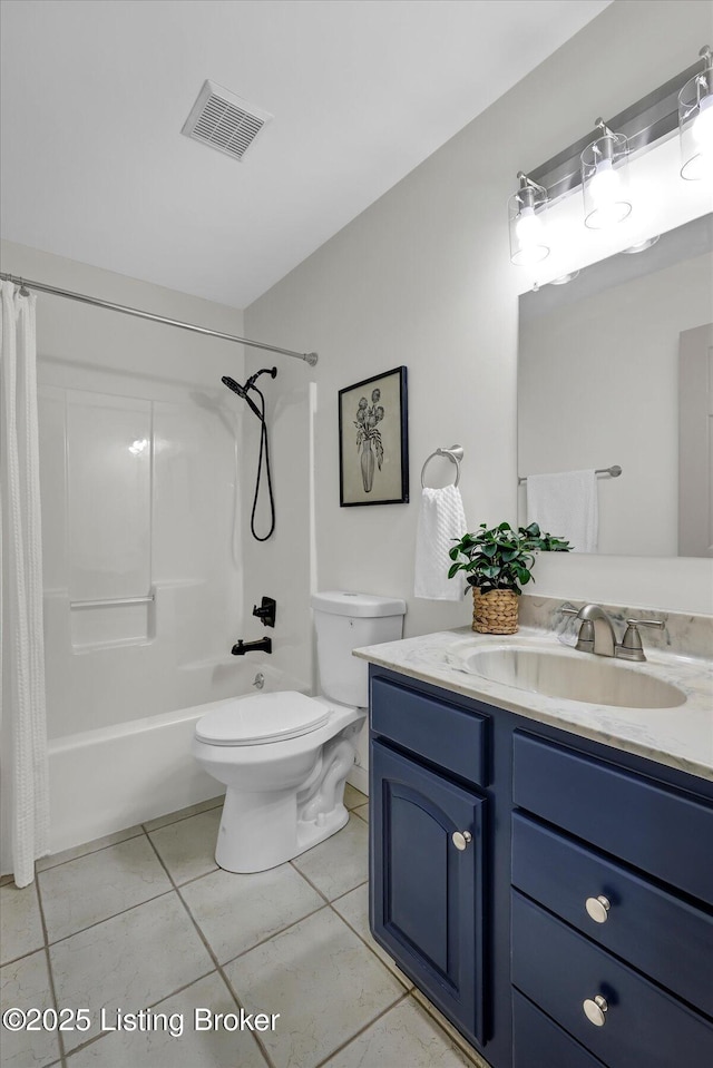 full bathroom with visible vents, toilet, shower / tub combo, vanity, and tile patterned flooring