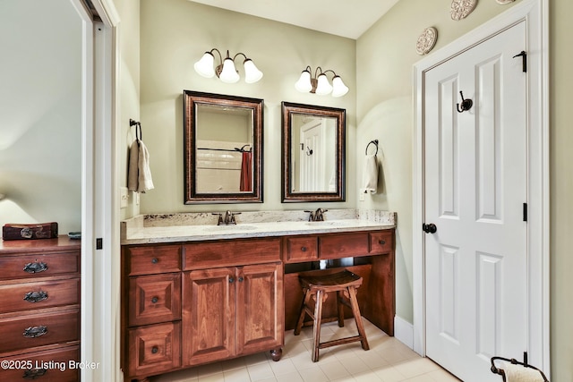 bathroom with double vanity and a sink