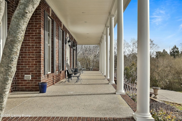 view of patio featuring a porch