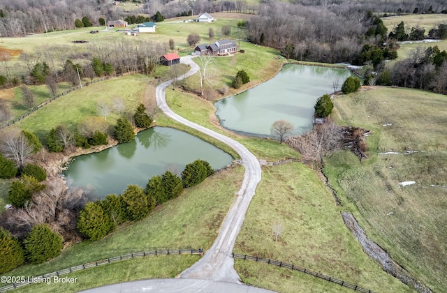 bird's eye view with a rural view and a water view