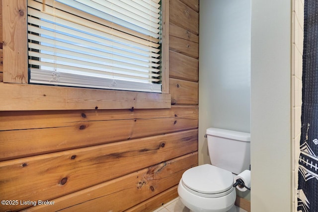 bathroom featuring toilet