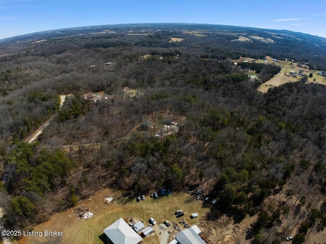 bird's eye view featuring a forest view