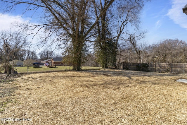 view of yard featuring fence