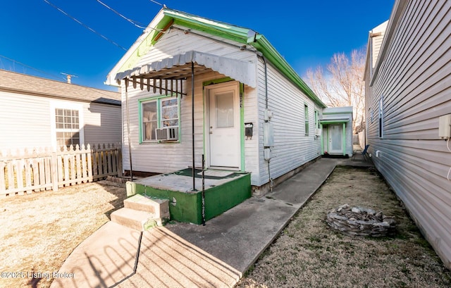 view of front of home with fence