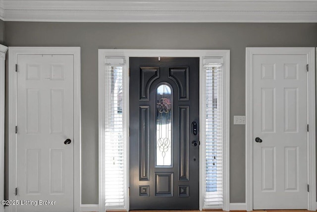 entryway with crown molding