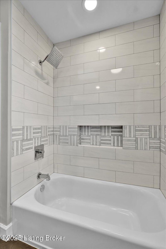 bathroom with shower / bathtub combination