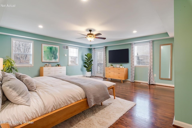 bedroom featuring recessed lighting, visible vents, dark wood-type flooring, ceiling fan, and baseboards