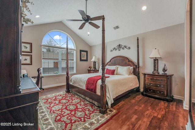 bedroom with dark wood finished floors, lofted ceiling, visible vents, ceiling fan, and baseboards