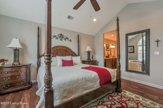 bedroom with ensuite bathroom, wood finished floors, visible vents, baseboards, and vaulted ceiling