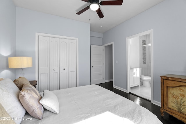 bedroom featuring dark wood-style flooring, a closet, a ceiling fan, connected bathroom, and baseboards