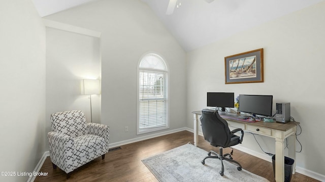 office space featuring high vaulted ceiling, ceiling fan, baseboards, and wood finished floors